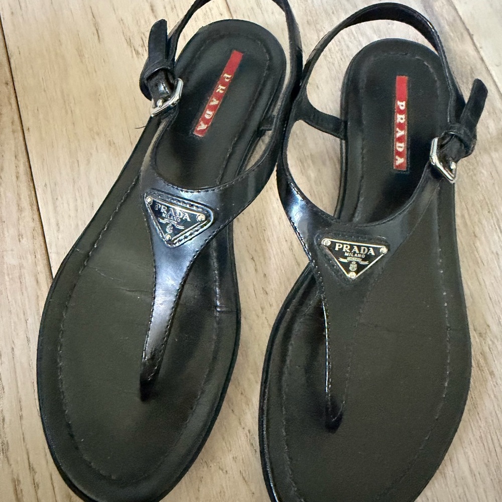 Prada Black Leather Slingback Thong Sandals with Red Logo Detail